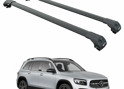 Two car roof racks on a white background with a silver Mercedes-Benz SUV below.